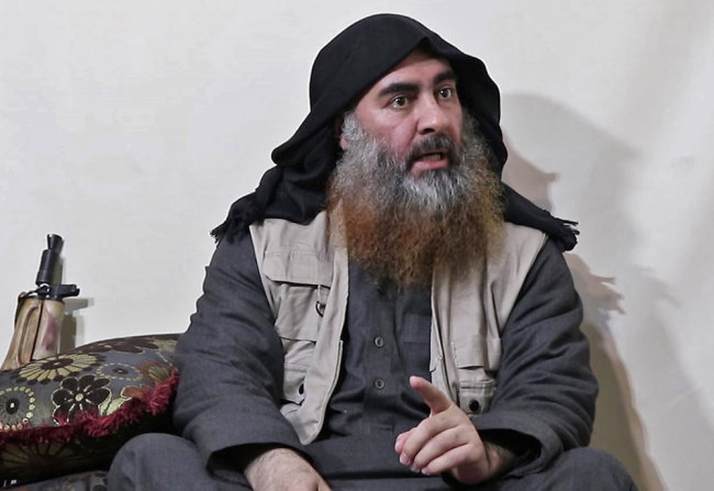 In this undated TV grab taken from a video released by Al-Furqan media, the chief of the Islamic State group Abu Bakr al-Baghdadi purportedly appears for the first time in five years in a propaganda video in an undisclosed location. [File photo: AFP / Al-Furqan media]