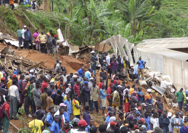 Rescue workers search through the rubble following a landslide in Bafoussam Cameroon, October 29, 2019. [Photo: AP]