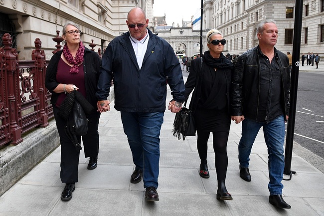 In this file photo taken on October 9, 2019, Charlotte Charles (2R) and Tim Dunn, (2L), parents of teenage motorcyclist Harry Dunn who was killed in a collision with a car, leave after a meeting with Britain's Foreign Secretary and First Secretary of State Dominic Raab at the Foreign and Commonwealth Office in central London on October 9, 2019. [Photo: AFP/DANIEL LEAL-OLIVAS]