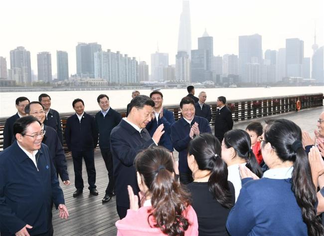 Chinese President Xi Jinping, also general secretary of the Communist Party of China Central Committee and chairman of the Central Military Commission, communicates with residents as he makes an inspection in Yangpu District of Shanghai, east China, Nov. 2, 2019. Xi went on an inspection tour in China's economic hub Shanghai Saturday. [Photo: Xinhua/Xie Huanchi]