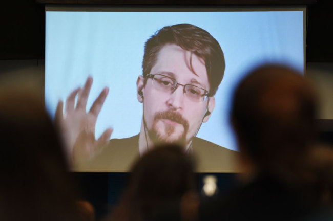 Former US National Security Agency (NSA) contractor and whistle blower Edward Snowden speaks via video link from Russia as he takes part in a round table meeting on the subject of "Improving the protection of whistleblowers" on March 15, 2019, at the Council of Europe in Strasbourg, eastern France. [Photo: AFP]