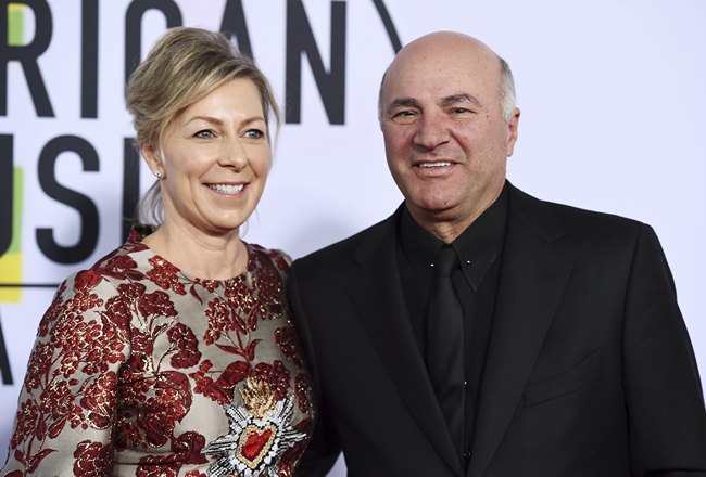 In this Nov. 19, 2017, file photo, Linda O'Leary and Kevin O'Leary arrive at the American Music Awards at the Microsoft Theater in Los Angeles. Linda O'Leary, the wife of "Shark Tank" star Kevin O'Leary, has been charged with careless operation of a vessel in a fatal boat crash in Canada, authorities said Tuesday, Sept. 24, 2019. [File Photo: Jordan Strauss/Invision/AP]