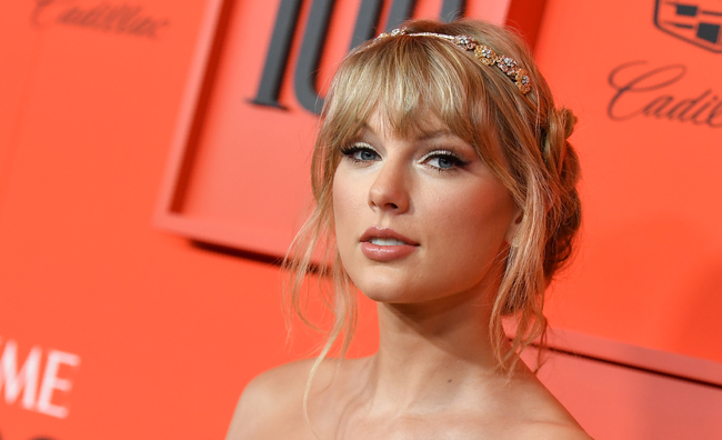 In this file photo Singer/songwriter Taylor Swift arrives on the red carpet for the Time 100 Gala at the Lincoln Center in New York on April 23, 2019. Unleash the Swifties: Taylor Swift has tapped her millions-strong social media fan base to pressure the heads of her former label, who she says are wielding "tyrannical control" over her music.[Photo: ANGELA WEISS/AFP]