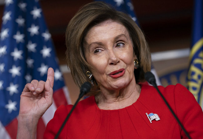 Speaker of the House Nancy Pelosi, D-Calif., talks to reporters on the morning after the first public hearing in the impeachment probe of President Donald Trump on his effort to tie U.S. aid for Ukraine to investigations of his political opponents, on Capitol Hill in Washington, Thursday, Nov. 14, 2019. [Photo: AP]