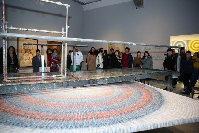 Visitors came to see artist Meng Luding's exhibition which opened in Beijing on Saturday, Nov 16, 2019.[Photo: China Plus]