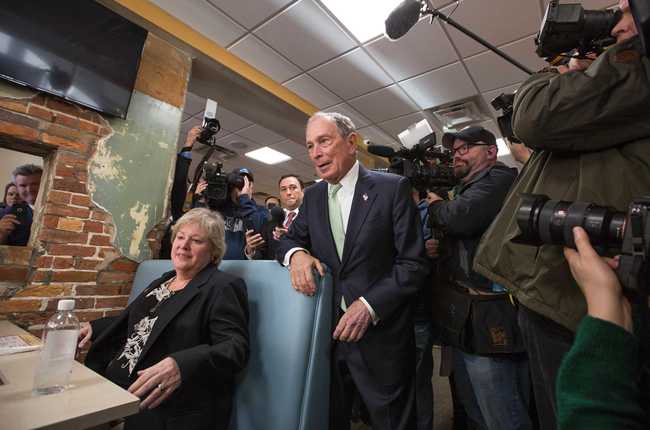 Democratic Presidential candidate Michael Bloomberg stands by Virginia delegate-elect Nancy Guy during his campaign stop in Norfolk, Va., Monday, Nov. 25, 2019.[Photo: AP]