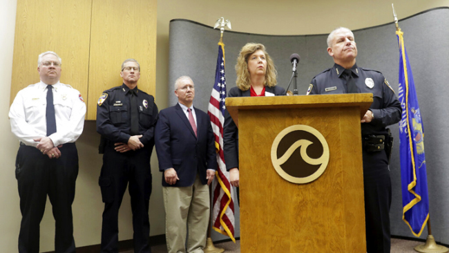 Oshkosh Police Chief Dean Smith and Superintendent of Schools Dr. Vickie Cartwright answer questions during a press conference following an officer involved shooting at Oshkosh West High School on December 3, 2019, in Oshkosh, Wis. [Photo: The Post-Crescent via AP/Wm. Glasheen]