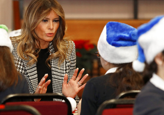 First lady Melania Trump joins local school students creating holiday decorations at the Salvation Army Clapton Center in London, Wednesday, Dec. 4, 2019. [Photo: AP]