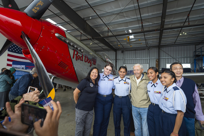 99 years old World War II veteran Harry Moyer poses in front of a P-51 Mustang fighter aircraft in Livermore, California, United States on December 7, 2019. [Photo: VCG]<br>