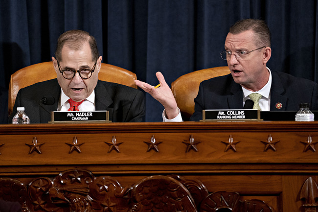 House Judiciary Committee Chairman Rep. Jerrold Nadler, D-N.Y., left, and ranking member Rep. Doug Collins, R-Ga., right, both speaking during a House Judiciary Committee markup of the articles of impeachment against President Donald Trump, on Capitol Hill Thursday, Dec. 12, 2019, in Washington. [Photo: AP/Andrew Harrer/Pool]