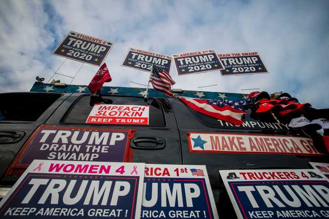 Trump supporters protest outside a town hall meeting where U.S. Rep. Elissa Slotkin (D-Mich.) is speaking on Monday, Dec. 16, 2019, in the Oakland Center at Oakland University in Rochester, Mich. [Photo: Jake May/The Flint Journal via AP]