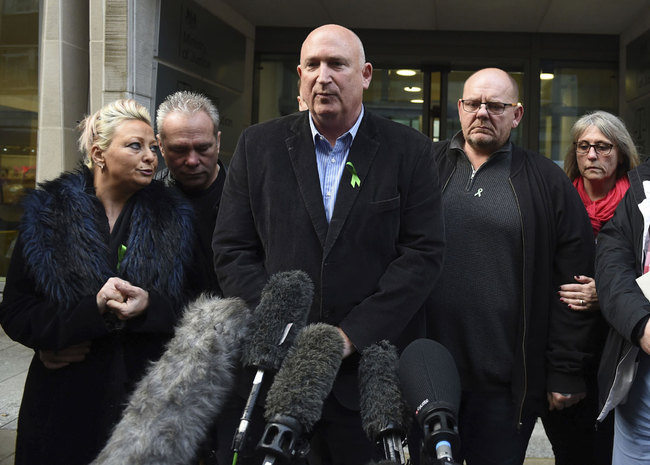 The family of Harry Dunn, from left, mother Charlotte Charles, stepfather Bruce Charles, family spokesman Radd Seiger, father Tim Dunn, and stepmother Tracey Dunn, speak to the media outside the Ministry of Justice in London on Friday, December 20, 2019. [Photo: AP]