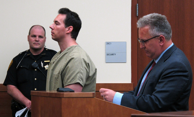 In this June 5, 2019 file photo former critical care doctor William Husel, center, pleads not guilty to murder charges while appearing with defense attorney Richard Blake, right, in Franklin County Court in Columbus, Ohio. [Photo: AP]