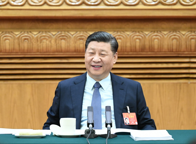 Xi Jinping dialogó con diputados comunes de las delegaciones