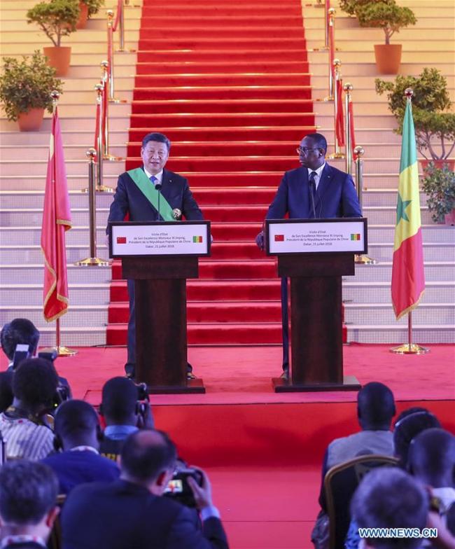 Le président Xi Jinping effectue sa première visite en Afrique de l’Ouest et s’entretient avec son homologue sénégalais Macky Sall