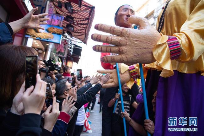Macao : défilé de célébrations pour le 20e anniversaire de sa rétrocession à la Chine