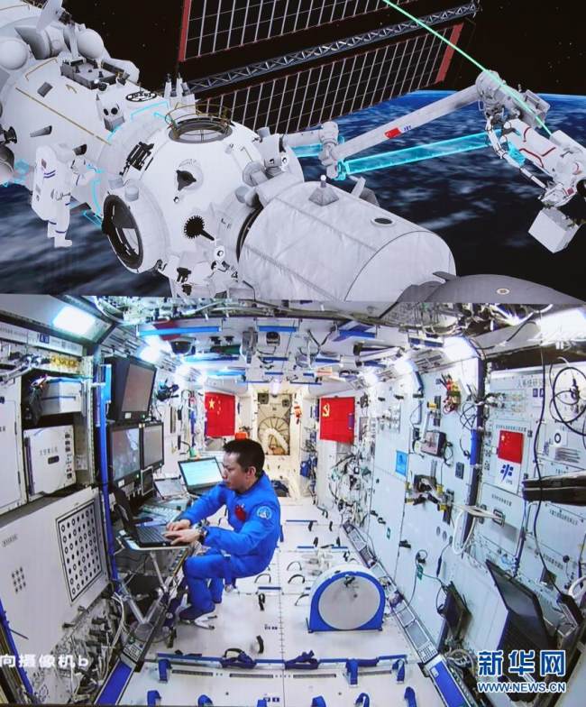 Astronautët bashkëpunonin për të kryer bashkërisht aktivitet jashtë mjetit kozmik(Foto:Xinhua)