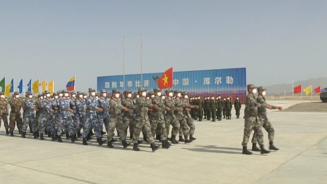 Vojáci ze sedmi zemí se shromáždili, aby se zúčastnili Mezinárodních armádních her 2021 v Korlev Ujgurské autonomní oblasti Xinjiang na severozápadě Číny, 22. srpna 2021. / Čínská lidová osvobozenecká armáda