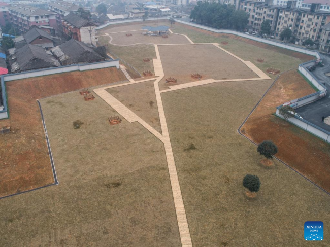 Αεροφωτογραφία που τραβήχτηκε στις 25 Ιανουαρίου 2019, δείχνει τον αρχαιολογικό χώρο Τουζισάν, στην πόλη Γιγιάνγκ της επαρχίας ειμηλίων και Αης ακτινοβολίας (δεξι Χουνάν, της κεντρικής Κίνας. (Γραφείο Τουρισμού, Πολιτισμού, Ραδιοφώνου, Τηλεόρασης και Αθλητισμού του Γιγιάνγκ)