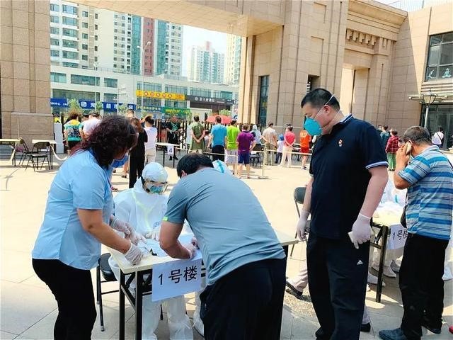 Residentes de Beijing estão em ação para combater COVID-19